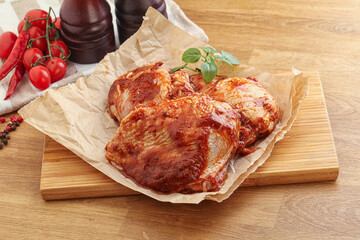 Marinated chicken leg in tomato sauce