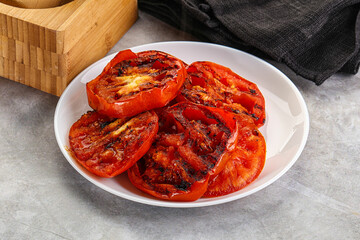 Griiled ripe red tomatoes snack