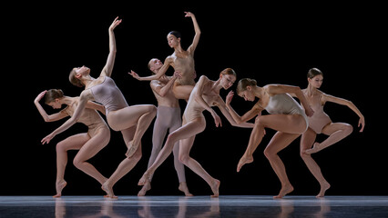 Tenderness and grace. Group of talented young people, elegant ballet dancers making performance...