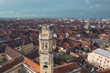 Fototapeta na wymiar Aerial art nouveau historical an aerial view of Oradea city with a stunning clock tower in the center incity Oradea, Bihor, Romania