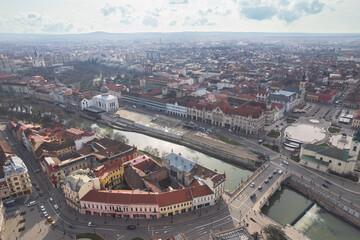 Oradea romania tourism aerial a vibrant city skyline illuminated at night, showcasing its historic and cultural attractions