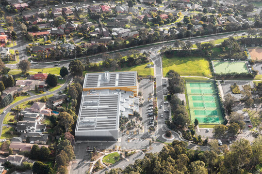 Aerial view of Modern Sports Facility Surrounded by Suburban Houses, Victoria, Australia.
