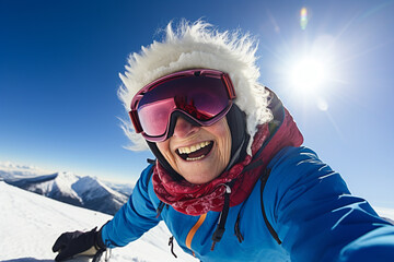 Fototapeta na wymiar happy granny snowboarder in the mountains