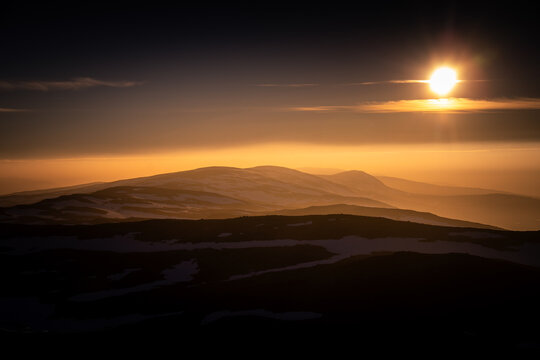 Midnight Sun Elegance: Aerial View Above the Fells of Swedish Lapland in Arctic Splendor