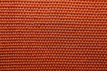 Fototapeta premium Polyester's Exquisite Details: A Captivating Closeup Unveiling Intricate Textures and Vibrant Hues of this Versatile Synthetic Material in Fashion and Textile Industry.