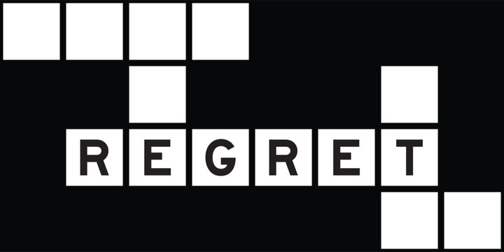 Alphabet letter in word regret on crossword puzzle background