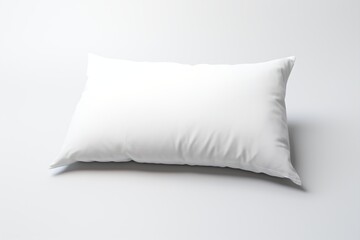 Fototapeta na wymiar A white pillow isolated on a white background