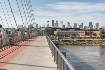 Photos of the Śląsko-Dąbrowski Bridge and the view of the city of Warsaw in Poland. We can see...