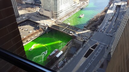 a picture of a city and river with bright green dye