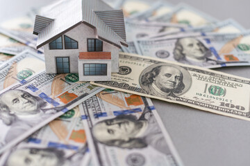 Small Model House on Newly Designed U.S. One Hundred Dollar Bills.