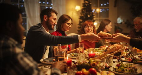 Portrait with Parents, Children and Friends Enjoying Christmas Dinner Together in a Cozy Home in...
