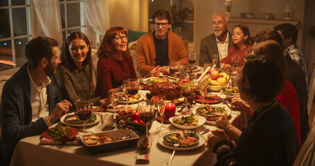 Family, Children, Friends and Young Couples Gather at Home for a Festive Christmas Evening. Diverse People Enjoy Delicious Turkey Feast and Share Heartwarming Conversations. Cozy Holiday Celebration