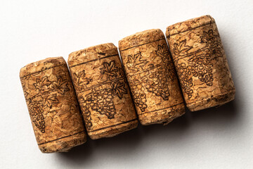 Several cork stoppers for wine bottles over white background