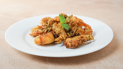 Crispy Shrimp on a white plate. Top angle.