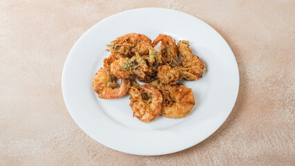 Crispy Shrimp on a white plate. Top angle.