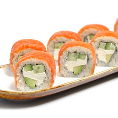 uramaki roll philadelphia on a white background, selective focus. Japanese kitchen. Sushi menu