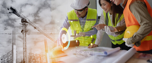Future building construction engineering and technology project concept. double exposure graphic with engineer using digital tablet and smart industry and IOT software to control operation.