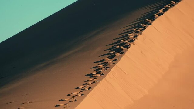 Beautiful sand dune, singing dune in Altyn Emel natural park in autumn, wind and sand in the sun