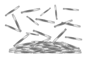 falling into a stack of coins isolated from the background, the concept of business success and investment, net profit	