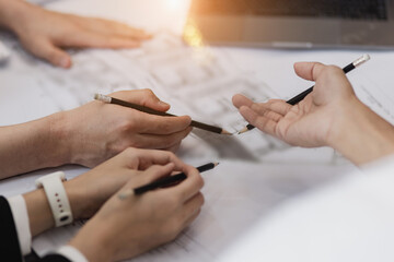 Business people working in team conference with project planning document on meeting table office. 