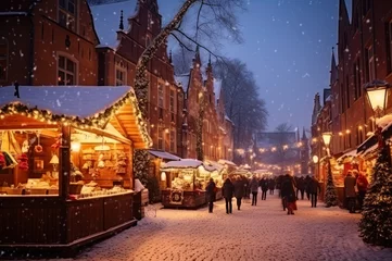 Fotobehang Christmas market in old town square at snowy evening. People walking the street. © SergeyIT