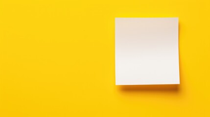 White reminder note sticker on a yellow background - obrazy, fototapety, plakaty