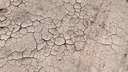 Long horizontal shot of dry land, cracked texture, drought land, desert land