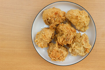 Fried tofu with spicy chiken filling. Often referred to as Tahu Mercon. Because it is deep fried, this tofu is also called Tahu Krispi. Traditional food from Indonesia which is crunchy and savory.