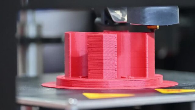 Close up scene the additive manufacturing by 3D printer machine.