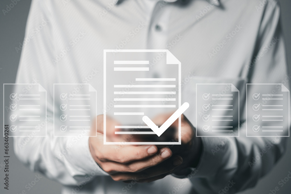 Poster document management concept, businessman using smartphone with online quality assurance approval doc