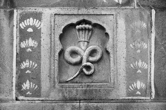Sculpture of a Snake on the wall of  Mahadev Temple, Wai, Pune, Maharashtra, India.