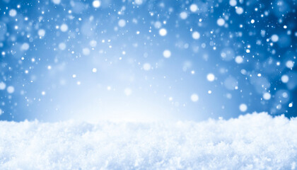 Naklejka premium Winter and snow storm with blue sky and snowflakes in bokeh soft light abstract background with white light in the middle. Copy space for text.