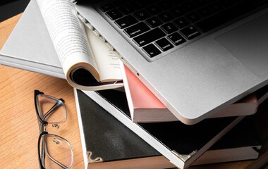 Creative Creativity Web Design desk with books, laptop and glasses on wooden background