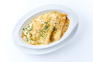 roasted pancakes wiht cheese in white plate