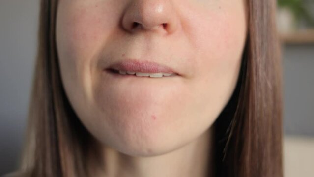 Oops. Sad terrified unrecognizable woman horrified facial expression made big mistake feel guilty biting her lips being nervous and expressing negative feelings.