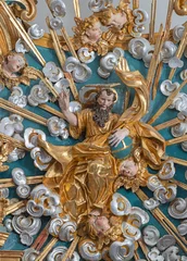 Foto op Plexiglas MORGEX, ITALY - JULY 14, 2018: The carved baroque polychrome relief of God the Creator on the main altar of church Chiesa di Santa Maria Assunta from 17. cent. © Renáta Sedmáková
