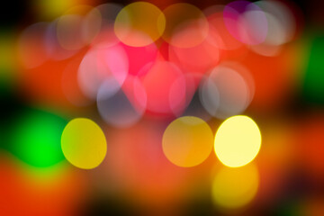 Joyful festive colorful bokeh spots for entertainment poster.