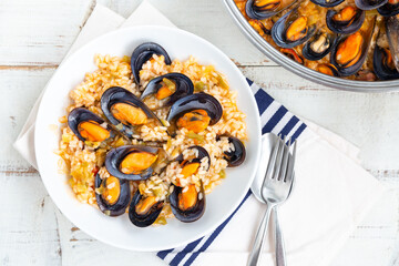 Delicious rice with mussels top view