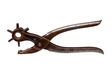 Tailoring accessories. Closeup of a antique adjustable Steel punch pliers or hole punch tool...