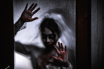 Halloween festival concept,Asian woman makeup ghost face,Bride zombie charactor,Horror movie...