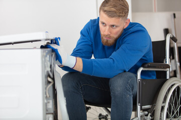 disabled man working as a repairman