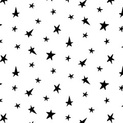 Pattern of black stars on a transparent background, seamless print for textiles and design. Wind painted with a brush