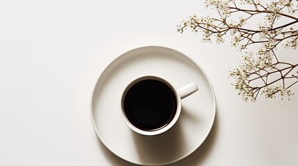 Fototapeta premium a cup of coffee next to a branch of a tree. generative ai