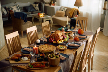 Dining room prepared for Thanksgiving meal at home.