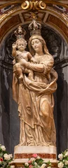 Foto op Plexiglas GENOVA, ITALY - MARCH 5, 2023: The marble statue of Madonna in church Basilica di Santa Maria delle Vigne by  Giovanni Battista and Tommaso Orsolino (1616). © Renáta Sedmáková