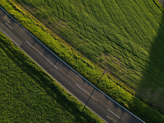 Aerial view of a road in the landscape on sunny evening 