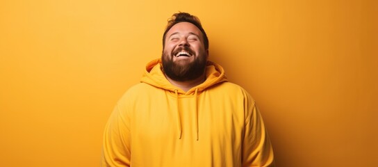 Obraz premium A contented, larger man on a bright background