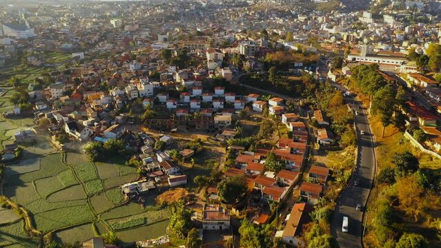 Aerial view of Antananarivo, beautiful and colourful town on the hillside at sunset, Analamanga, Madagascar.