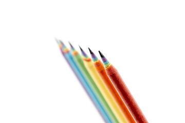 Set of  Colored Pencils Made by Recycled Paper arranged on white background. Environmentally friendly stationary supplies