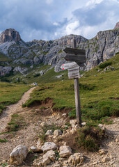 Tourist routes in the mountains. Signs, directions, designations, popular places for tourists. Dolomites, Italy